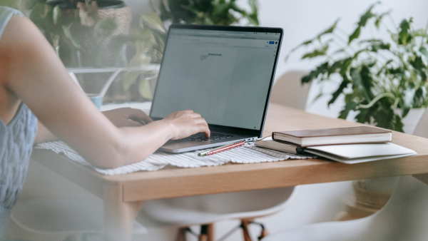 A woman creating content for a website